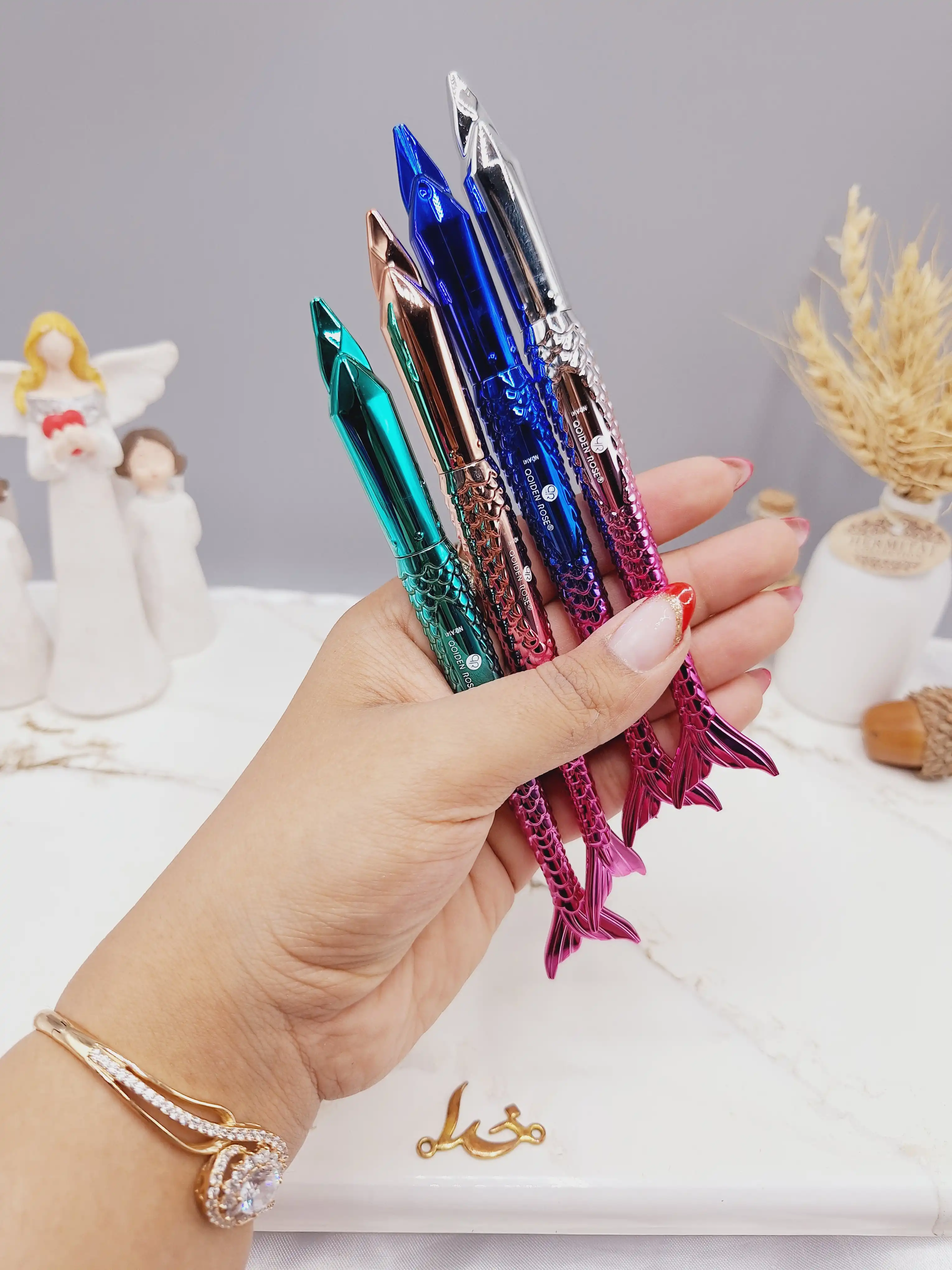 خط چشم ماژیکی طرح پری دریایی برند QOIDEN ROSE کد A141